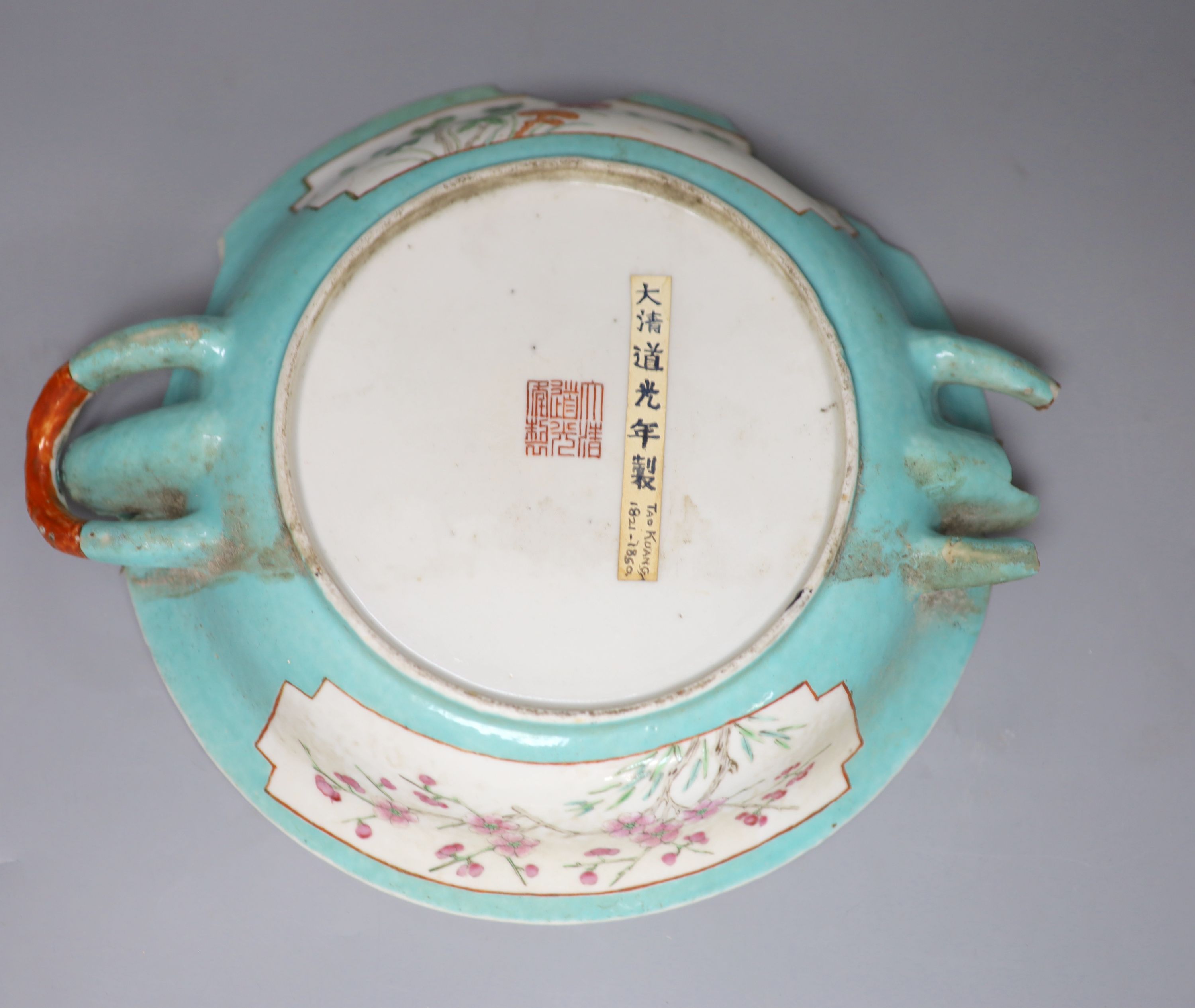 A Chinese green ground hot water dish, Daoguang mark and period, damaged